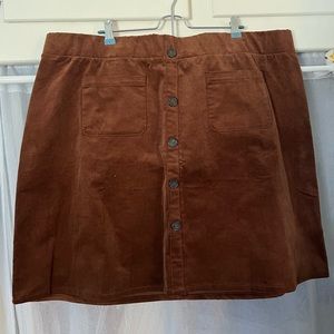 Torrid straight brown skirt, never worn, extra button attached